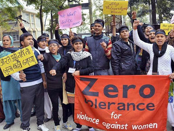 People protesting for crime against women in india. 