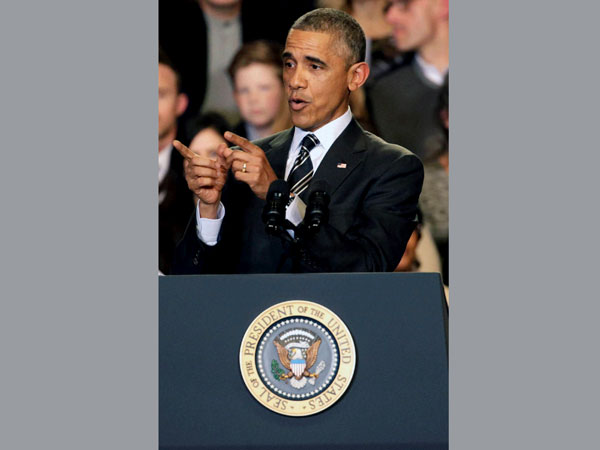 Barack Obama heckled at gathering