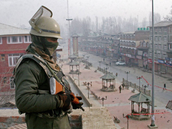 A security jawan keeps vigil