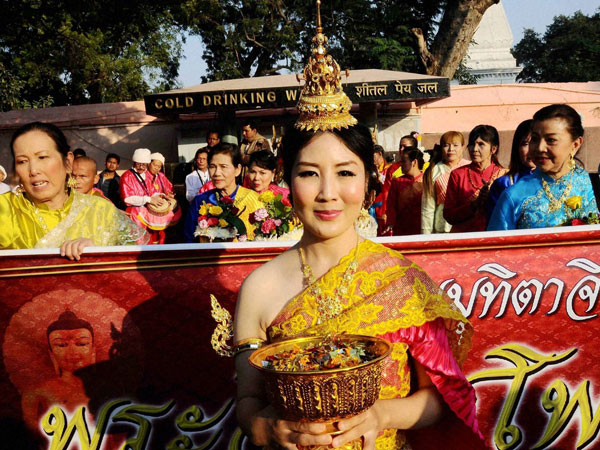 Devotees from Thailand take part in a procession