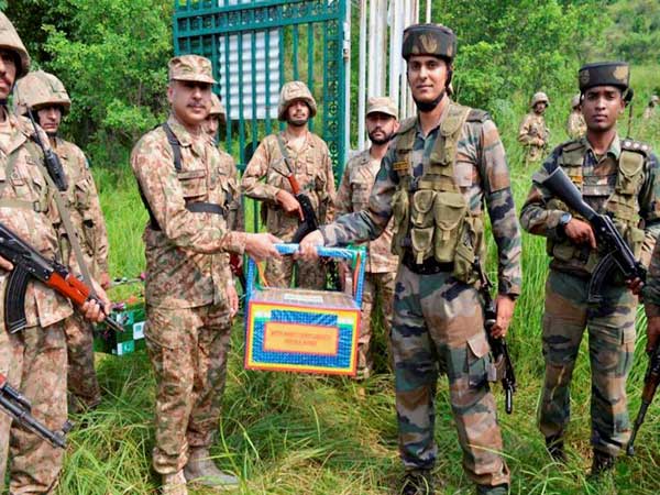 Pak Rangers offer sweets to BSF Pak Rangers offer sweets to BSF