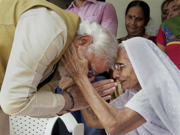Modi being blessed by his mother