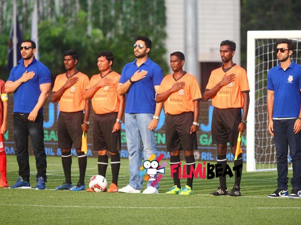 John, Abhishek, Ranbir with football players