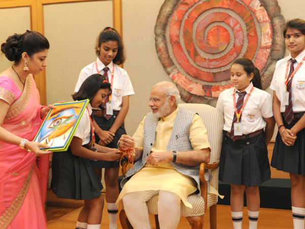 PM Modi meets school girls on Rakhi in New Delhi