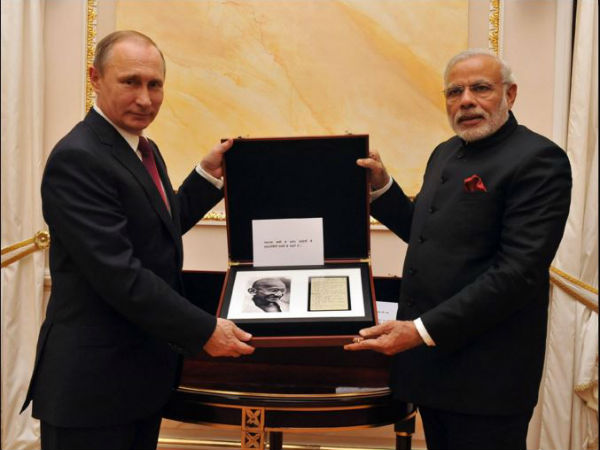 President Putin gifts a page from Gandhi ji's diary to PM Modi