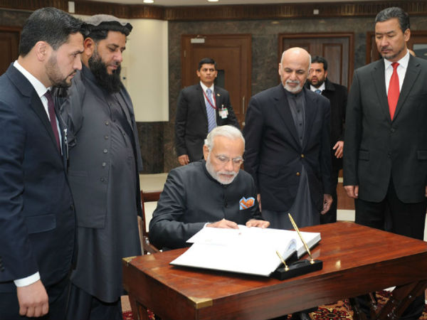 PM Modi writes at visitors book at newly inaugurated Parliament Building