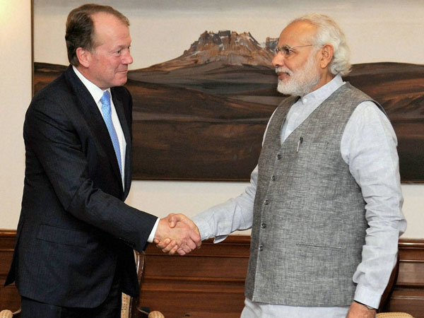 File Photo: Prime Minister Narendra Modi shakes hands with Chairman, CISCO, John Chambers during a meeting in New Delhi. File Photo: Prime Minister Narendra Modi shakes hands with Chairman, CISCO, John Chambers during a meeting in New Delhi.