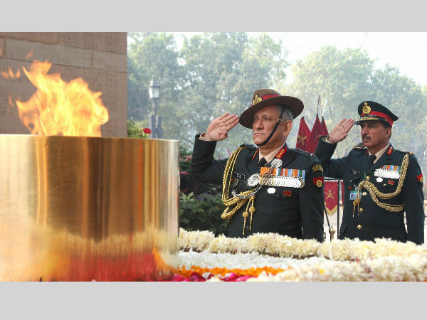 Chief of Army Staff, General Bipin Rawat paying homage at Amar Jawan Jyoti, India Gate, in New Delhi. PTI Photo Chief of Army Staff, General Bipin Rawat paying homage at Amar Jawan Jyoti, India Gate, in New Delhi. PTI Photo