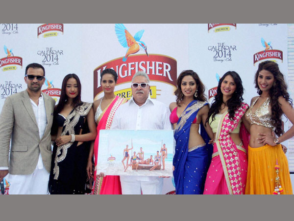 File photo of Vijay Mallya, Chairman of UB Group with models during the launch of Kingfisher Calendar 2014 at Kingfisher House near Alibaug, Maharashtra. File photo of Vijay Mallya, Chairman of UB Group with models during the launch of Kingfisher Calendar 2014 at Kingfisher House near Alibaug, Maharashtra.