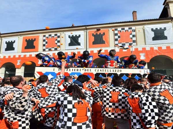 Revellers throng Battle of Oranges