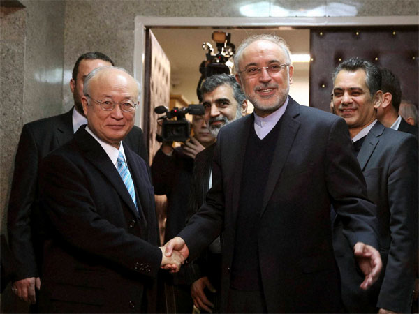 Iran's Atomic Energy Organisation Chief Ali Akbar Salehi, right, welcomes International Atomic Energy Agency Director General Yukiya Amano for their meeting in Tehran, Iran. Iran's Atomic Energy Organisation Chief Ali Akbar Salehi, right, welcomes International Atomic Energy Agency Director General Yukiya Amano for their meeting in Tehran, Iran.