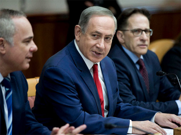 Israeli Prime Minister Benjamin Netanyahu, center, attends the weekly cabinet meeting at his office in Jerusalem, Israel, Sunday, Jan. 29, 2017. Israeli Prime Minister Benjamin Netanyahu, center, attends the weekly cabinet meeting at his office in Jerusalem, Israel, Sunday, Jan. 29, 2017.
