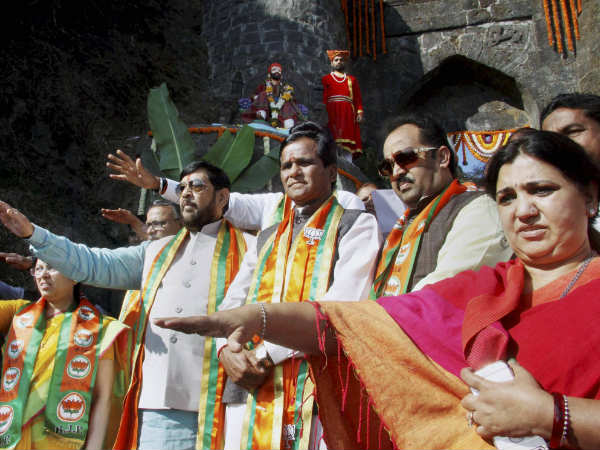 BJP leader Raosaheb Danve (C) during an election campaign at Shingad Fort in Pune BJP leader Raosaheb Danve (C) during an election campaign at Shingad Fort in Pune