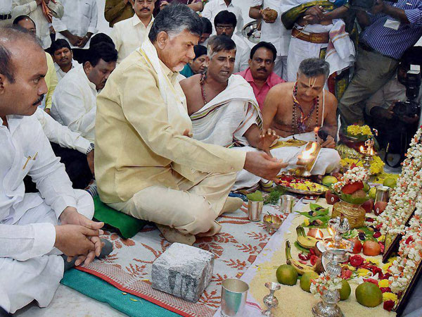 AP Chief Minister N Chandrababu Naidu performs rituals after entering into his new office chamber in the Government's Transitional Headquarters at Velagapudi in the Amaravati capital region, Andhra Pradesh. AP Chief Minister N Chandrababu Naidu performs rituals after entering into his new office chamber in the Government's Transitional Headquarters at Velagapudi in the Amaravati capital region, Andhra Pradesh.