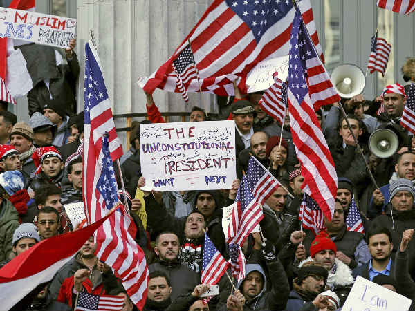 Muslims and Yemenis gather with their supporters on the steps of Brooklyn's Borough Hall, during a protest against President Donald Trump’s temporary travel ban on citizens from seven predominantly Muslim countries. Muslims and Yemenis gather with their supporters on the steps of Brooklyn's Borough Hall, during a protest against President Donald Trump’s temporary travel ban on citizens from seven predominantly Muslim countries.