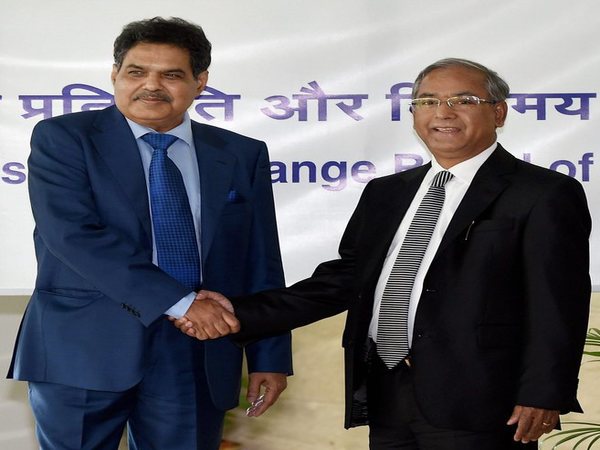 Newly appointed SEBI Chairman, Ajay Tyagi (left) is greeted by the outgoing chairman, U K Sinha, in Mumbai Newly appointed SEBI Chairman, Ajay Tyagi (left) is greeted by the outgoing chairman, U K Sinha, in Mumbai