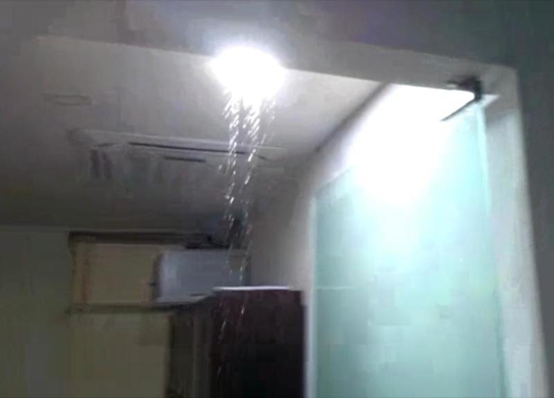 Water pouring in chamber through ceiling