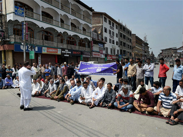 Members of Kashmir Traders and Manufacturers Fedration during a protest against GST at Lal Chowk in Srinagar. (PTI) Members of Kashmir Traders and Manufacturers Fedration during a protest against GST at Lal Chowk in Srinagar. (PTI)