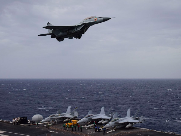 As part of ongoing Malabar 2017 exercise, Indian Navy MIG-29K Fulcrums fly over USS Nimitz while training together. Photo credit: Indian Navy/ Twitter: SpokespersonNavy) As part of ongoing Malabar 2017 exercise, Indian Navy MIG-29K Fulcrums fly over USS Nimitz while training together. Photo credit: Indian Navy/ Twitter: SpokespersonNavy)