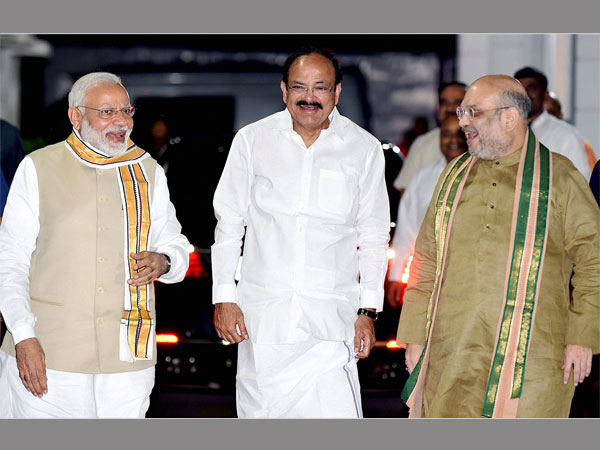Union Minister M. Venkaiah Naidu with Prime Minister Narendra Modi and BJP President Amit Shah after he was announced as the BJP's Vice-Presidential candidate in New Delhi Union Minister M. Venkaiah Naidu with Prime Minister Narendra Modi and BJP President Amit Shah after he was announced as the BJP's Vice-Presidential candidate in New Delhi