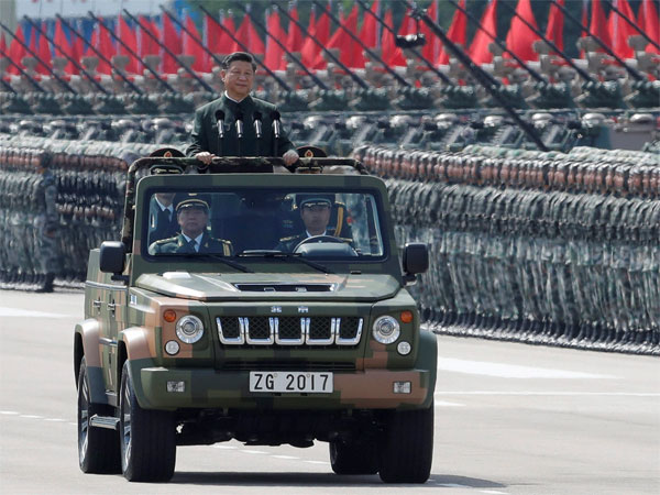 Chinese President Xi Jinping inspects the People's Liberation Army. Photo credit: PTI Chinese President Xi Jinping inspects the People's Liberation Army. Photo credit: PTI