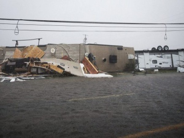 A trailer home ripped apart by the hurricane