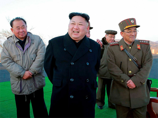In this March 6, 2017, photo distributed by the North Korean government, leader Kim Jong Un, center, smiles at an observation post to watch the launching of Scud missiles in Tongchang-ri in North Pyongan Province, North Korea. PTI file photo In this March 6, 2017, photo distributed by the North Korean government, leader Kim Jong Un, center, smiles at an observation post to watch the launching of Scud missiles in Tongchang-ri in North Pyongan Province, North Korea. PTI file photo