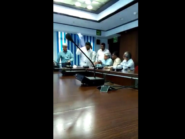 NCP leader is seen abusing IAS officer during a meet NCP leader is seen abusing IAS officer during a meet
