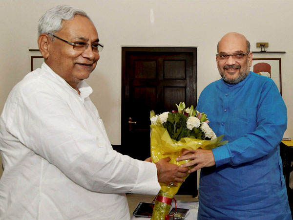 Bihar Chief Minister Nitish Kumar greets BJP President Amit Shah in a meeting at the latter's residence, in New Delhi Bihar Chief Minister Nitish Kumar greets BJP President Amit Shah in a meeting at the latter's residence, in New Delhi