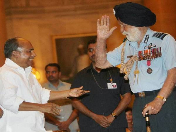 With the then Defense Minister