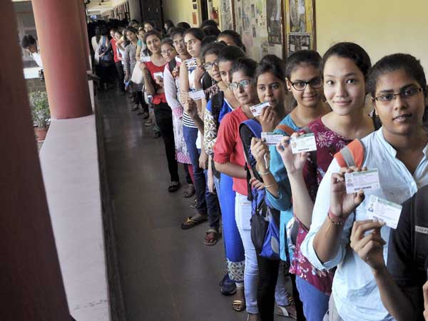 Students queue up to cast their votes for the Delhi University Students' Union Elections (DUSU) at Miranda House college in North Campus of Delhi University in New Delhi on Tuesday. PTI Photo Students queue up to cast their votes for the Delhi University Students' Union Elections (DUSU) at Miranda House college in North Campus of Delhi University in New Delhi on Tuesday. PTI Photo