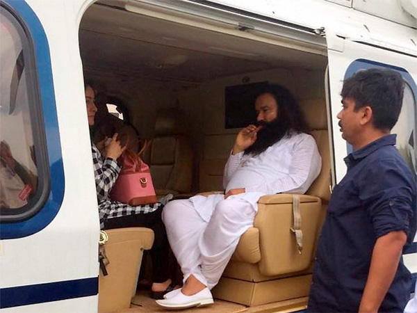 Dera Sacha Sauda chief Gurmeet Ram Rahim in a helicopter in which he was flown from Panchkula to Rohtak town to lodged in jail. PTI file Photo Dera Sacha Sauda chief Gurmeet Ram Rahim in a helicopter in which he was flown from Panchkula to Rohtak town to lodged in jail. PTI file Photo