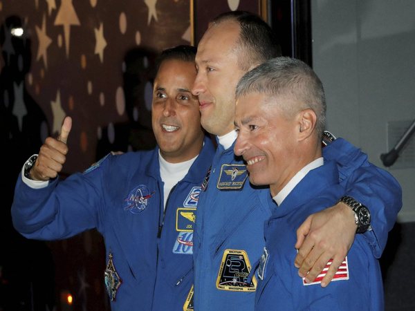 Russian cosmonaut Alexander Misurkin, center, U.S. astronauts Joseph Acaba, left, and Mark Vande Hei, members of the main crew to the International Space Station (ISS), wave to their relatives near a bus prior the launch of Soyuz-FG rocket at the Russian leased Baikonur cosmodrome, Kazakhstan, Tuesday Russian cosmonaut Alexander Misurkin, center, U.S. astronauts Joseph Acaba, left, and Mark Vande Hei, members of the main crew to the International Space Station (ISS), wave to their relatives near a bus prior the launch of Soyuz-FG rocket at the Russian leased Baikonur cosmodrome, Kazakhstan, Tuesday