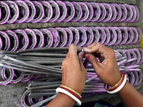A woman making fire crackers