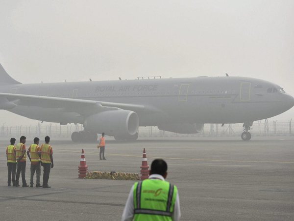Plane covered in smog Plane covered in smog
