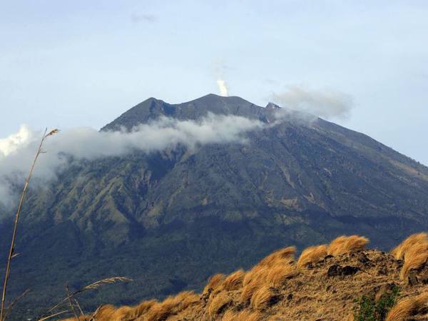 Mount Agung volcano is seen from Kubu village Mount Agung volcano is seen from Kubu village