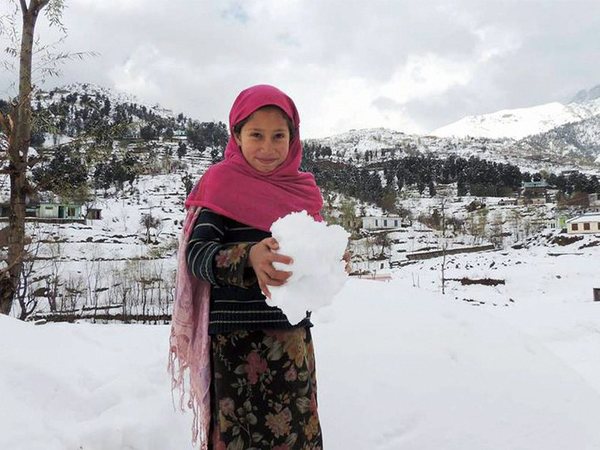 A girl enjoys snow after fresh snowfall in Bafliaz Dera-Ki-Gali in Pir Panchal in Poonch District of Jammu and Kashmir on Saturday PTI Photo A girl enjoys snow after fresh snowfall in Bafliaz Dera-Ki-Gali in Pir Panchal in Poonch District of Jammu and Kashmir on Saturday PTI Photo