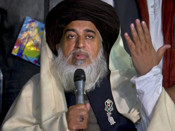 Head of the Pakistani Tehreek-i-Labaik Ya Rasool Allah radical religious party, Khadim Hussain Rizvi gestures during a press conference regarding Saturday's police operation against them, in Islamabad, Pakistan, Sunday, Nov. 26, 2017. Pakistani Islamists pressed ahead with their rally near Islamabad in even larger numbers on Sunday, a day after clashes with police left six dead and dozens wounded. AP/PTI photo Head of the Pakistani Tehreek-i-Labaik Ya Rasool Allah radical religious party, Khadim Hussain Rizvi gestures during a press conference regarding Saturday's police operation against them, in Islamabad, Pakistan, Sunday, Nov. 26, 2017. Pakistani Islamists pressed ahead with their rally near Islamabad in even larger numbers on Sunday, a day after clashes with police left six dead and dozens wounded. AP/PTI photo