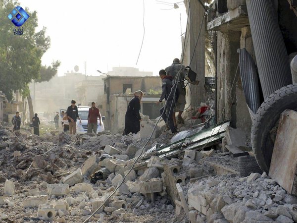 This image released by Thiqa News Agency shows people inspecting damage from airstrikes on a market in Atareb, in the opposition-held countryside outside Aleppo Syria, Monday, Nov. 13, 2017. PTI file photo This image released by Thiqa News Agency shows people inspecting damage from airstrikes on a market in Atareb, in the opposition-held countryside outside Aleppo Syria, Monday, Nov. 13, 2017. PTI file photo