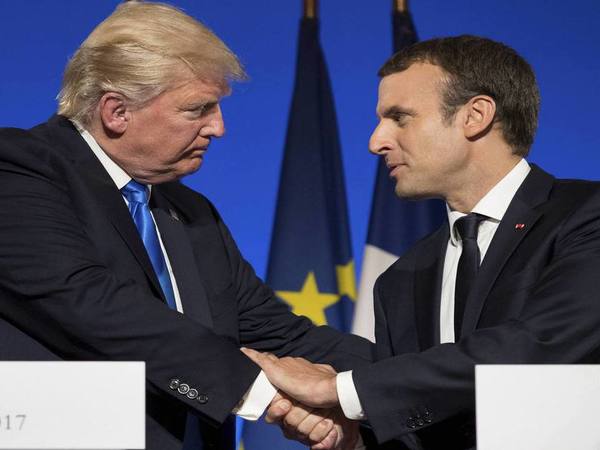 President Donald Trump and French President Emmanuel Macron. PTI file photo President Donald Trump and French President Emmanuel Macron. PTI file photo