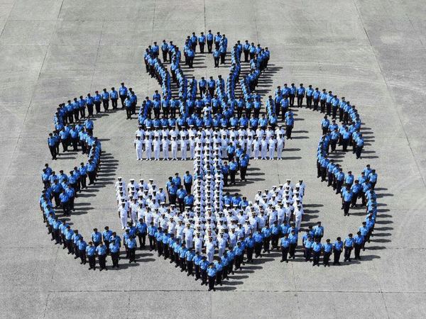 Naval personnel in anchor formation