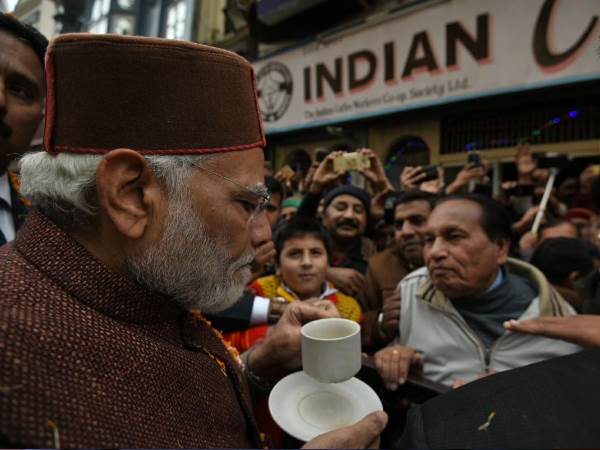 PM Modi takes a coffee break. Photo credit: ANI PM Modi takes a coffee break. Photo credit: ANI