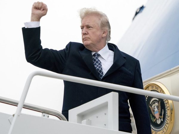 President Donald Trump gestures as he boards Air Force One at Andrews Air Force Base, Md., Friday, Jan. 12, 2018, to travel to Palm Beach International Airport in West Palm Beach, Fla. AP/PTI Photo President Donald Trump gestures as he boards Air Force One at Andrews Air Force Base, Md., Friday, Jan. 12, 2018, to travel to Palm Beach International Airport in West Palm Beach, Fla. AP/PTI Photo