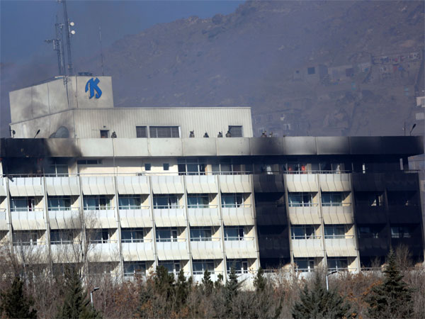 Afghan security personnel are seen at the roof of Intercontinental Hotel after an attack in Kabul, Afghanistan Afghan security personnel are seen at the roof of Intercontinental Hotel after an attack in Kabul, Afghanistan