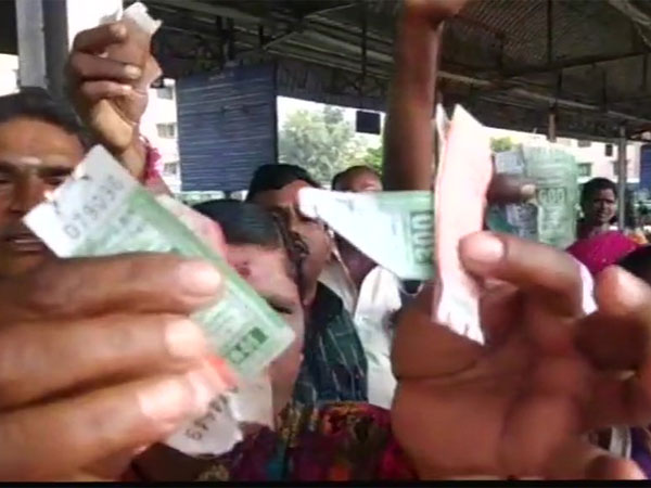 Passengers protest at Coimbatore's Ukkadam Bus Terminus against a hike in bus fares. Courtesy: ANI news Passengers protest at Coimbatore's Ukkadam Bus Terminus against a hike in bus fares. Courtesy: ANI news