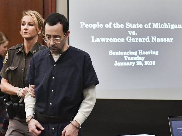 Larry Nassar is brought into court Tuesday, Jan. 23, 2018, in Lansing, Mich. Nassar, 54, has admitted sexually assaulting athletes under the guise of medical treatment when he was employed by Michigan State University and USA Gymnastics, which as the sport's national governing organization trains Olympians. He already has been sentenced to 60 years in prison for child pornography. Under a plea bargain, he faces a minimum of 25 to 40 years behind bars in the molestation case. AP/PTI Photo Larry Nassar is brought into court Tuesday, Jan. 23, 2018, in Lansing, Mich. Nassar, 54, has admitted sexually assaulting athletes under the guise of medical treatment when he was employed by Michigan State University and USA Gymnastics, which as the sport's national governing organization trains Olympians. He already has been sentenced to 60 years in prison for child pornography. Under a plea bargain, he faces a minimum of 25 to 40 years behind bars in the molestation case. AP/PTI Photo