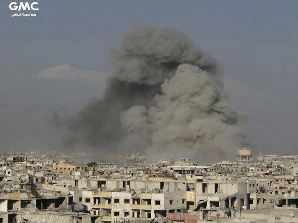 This photo released on Friday, Feb. 23, 2018 by the Syrian anti-government activist group Ghouta Media Center, which has been authenticated based on its contents and other AP reporting, shows smoke rising after Syrian government airstrikes hit Ghouta, suburb of Damascus, Syria. PTI This photo released on Friday, Feb. 23, 2018 by the Syrian anti-government activist group Ghouta Media Center, which has been authenticated based on its contents and other AP reporting, shows smoke rising after Syrian government airstrikes hit Ghouta, suburb of Damascus, Syria. PTI