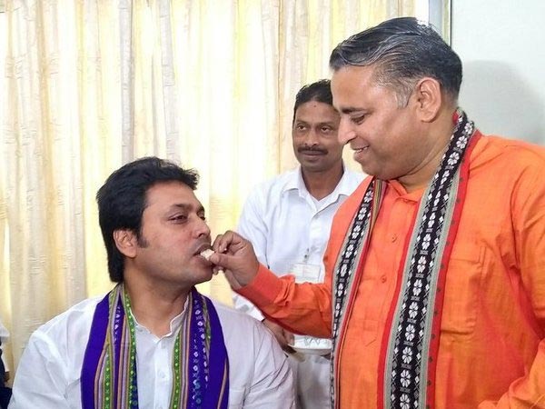 Biplab Kumar Deb took charge as Chief Minister, Sunil Deodhar offers sweets. Courtesy: @BjpBiplab Biplab Kumar Deb took charge as Chief Minister, Sunil Deodhar offers sweets. Courtesy: @BjpBiplab