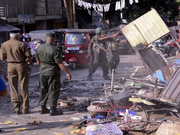 Sri Lanka's army soldiers remove the debris of a vandalized building in Digana, a suburb of Kandy, Sri Lanka, March 6, 2018. Buddhist mobs swept through the town. PTI file photo Sri Lanka's army soldiers remove the debris of a vandalized building in Digana, a suburb of Kandy, Sri Lanka, March 6, 2018. Buddhist mobs swept through the town. PTI file photo