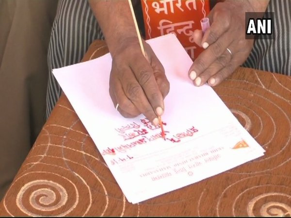 Blood letter written by Hindu Mahasabha members (Image courtesy - ANI/Twitter) Blood letter written by Hindu Mahasabha members (Image courtesy - ANI/Twitter)